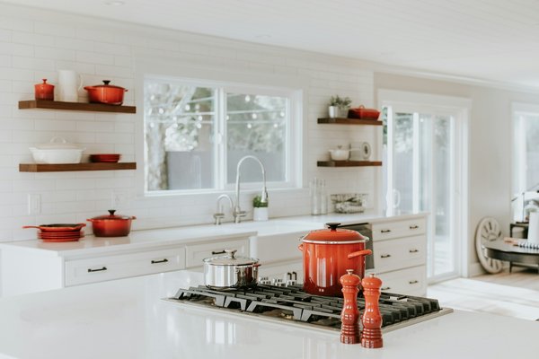 How can you maximize counter space in a small kitchen design?